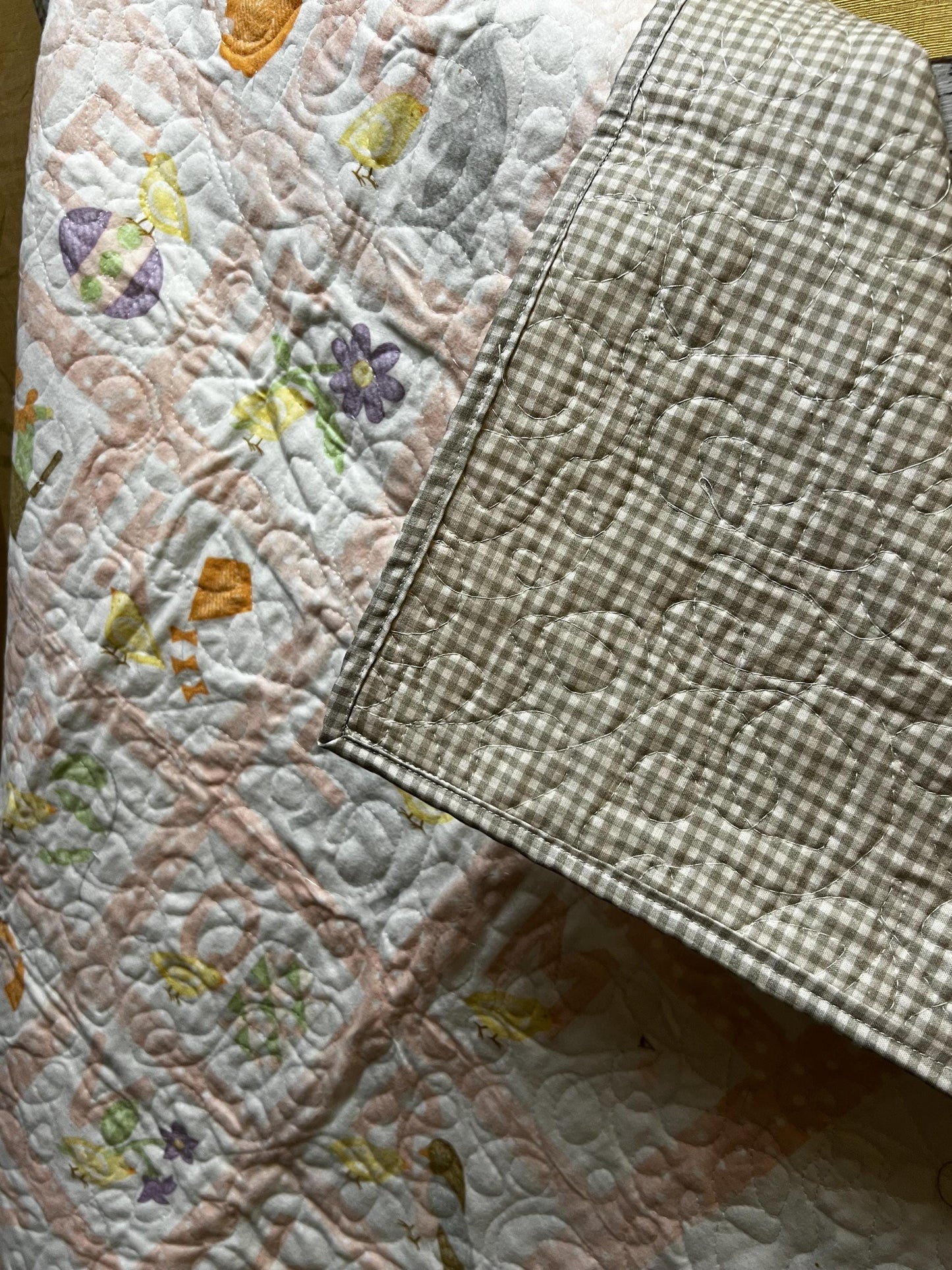 Handmade quilted baby blanket with alphabets, animals, light pastel colors